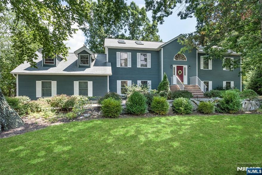 BEST AND FINAL 0FFERS MUST BE EMAILED TO ME BY MONDAY 4/14/2025 AT 5 PM. PLEASE INCLUDE SELLERS DISCLOSURE & PRE APPROVAL LETTERS. Welcome to your Dream Home. A Rare Opportunity to Own this Stunning Custom 5 Bedroom, 4 Bathroom Home in a Very Prestigious Neighborhood of Million Dollar Homes. New Modern Kitchen in 2023 with White Cabinetry, Quartz Counter Tops & New Stainless-Steel Appliances. This Sensational Home Offers Many Different Options for all lifestyles with a Seamless Flow. Perfect for working at home with a Possible In-Law Suite. Experience Unparalleled Living with Natural Light through-out the Living Spaces. The Walk -Out Ground Level Offers a Great Room with a Stone Fireplace, Custom Wet Bar, 2 Bedrooms, A Full Bathroom and a Laundry Room/Mud Room. Enjoy the Fabulous Outdoor Entertaining Space with a Deck and Beautiful Lush Backyard with Outcroppings. New Roof in 2024, New Heating System in 2024, Newer Air Conditioning, Newer Recessed Lighting in the Living Room & Primary Bedroom and an Attic w Plenty of Room for Storage.