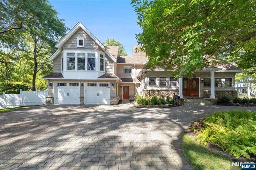 Old-world charm meets updated luxury â€¦ Welcome to this stunning Fieldstone colonial, where timeless architecture and thoughtful updates come together in perfect harmony. A spacious addition has expanded this home into a true showpiece, offering a lifestyle of comfort, elegance, and entertainment. At the heart of this home is the fabulous, professionally outfitted gourmet kitchen, which is open, spacious, and bright. It has an oversized island with seating, which is ideal for everyday living and hosting gatherings. From the kitchen, you step out onto your very own private backyard paradise. The deck has a big roof with skylights, ceiling fans, and open sides. This sprawling outside space is truly a party-ready oasis. The Great Room impresses with soaring vaulted ceilings, custom wainscoting, and its own kitchenette. Plenty of storage, a 2-car oversized garage, updated baths, and on a residential side street. All just a short walk to downtown Park Ridge, offering excellent shopping, restaurants, parks, and easy access to both Train and Bus service into New York City. Add in top-rated schools, and this home has it all! This is more than a house, it's a lifestyle. Don't miss your chance to call it home!