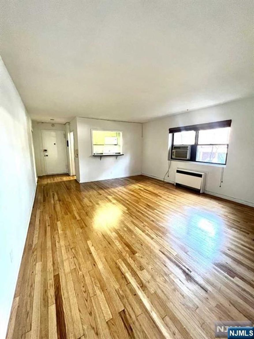 Spacious & Updated 1 bedroom Apartment in the serene tree-lined community of Fort Lee's desirable Linwood Park. Updated kitchen with clean appliances, refrigerator, hardwood floors throughout. Heat/Hot water included in the rent, laundry in Building. Bus stop less than 5 mins away, includes express routes to NYC. GWB nearby. Cable & Internet $55 monthly. Near Linwood Plaza Shopping Center, with Starbucks, H-Mart, Starbucks, 24 hour CVS and much more!NO PETS, street parking available, and parking lot for a small fee of $300 a year. $300 APPLICATION FEE IS NOT REFUNDABLE,$500 MOVE IN FEE IS REFUNDABLE. Tenant must provide 2 year tax returns, 3 recent Pay stubs, full credit report. Minimum income requirement 65k.