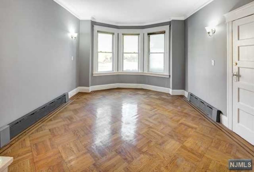 INVESTORS DREAM! Don't miss out on this incredible opportunity to own this stunning 2 family home in the heart of Weehawken with great rental income. Parking is available through Weehawken parking permit, street parking is very easily accessible, parking lot nearby. The spacious first floor offers an open concept from living room to dining room. You will be astonished from the crown moldings, high ceilings, and sunroom leading to your own private yard. The second floor offers the same layout and also includes a den/office. Both floors offer gleaming inlaid hardwood floors, updated kitchen with stainless steel appliances, and updated bathrooms. The finished basement gives you the opportunity to easily convert this home to a 3 family for additional income. Great location and very short distance to Blvd East, NYC trans, parks, and shopping.