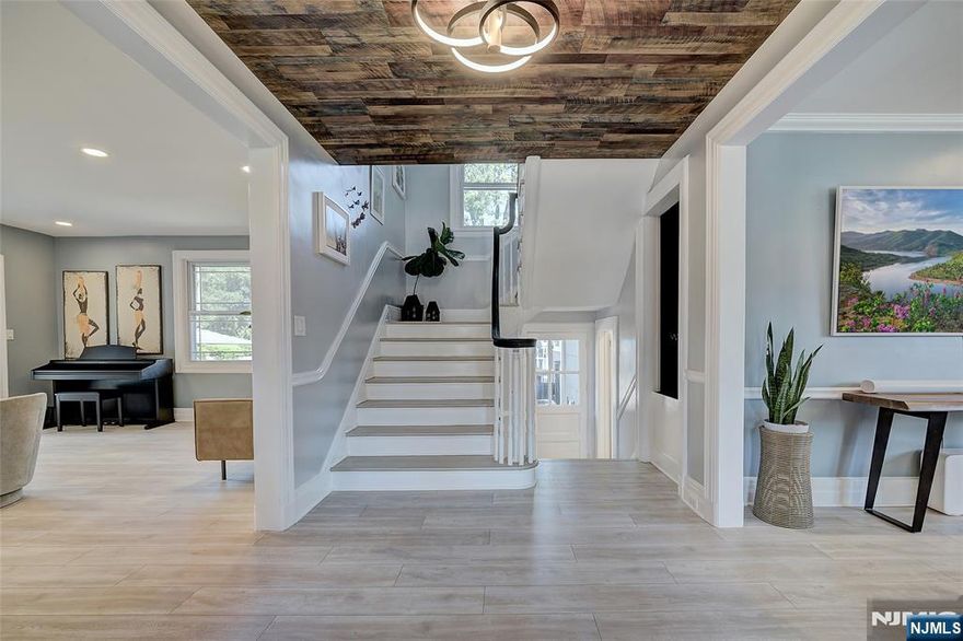 Welcome to 21 Melrose Place, Montclair - a beautifully renovated home that blends timeless character with modern living. Renovated & Move-In Ready: Updated finishes, abundant natural light, and a layout designed for both everyday comfort and entertaining. Spacious Bedrooms & Spa-Like Baths: Upstairs retreats that balance style with comfort. Flexible Living Spaces: Dedicated areas for work, play, or hosting. Backyard Sanctuary: Private, landscaped yard perfect for gatherings or quiet mornings. Commuterâ€™s Dream Just 2 blocks to NJ Transit Bus 101 (daily service to NYC Port Authority) Bay Street Station (less than a 5-minute drive) with direct trains to NYC Penn Station Prime Montclair Location - Vibrant downtown, restaurants, shops, top schools, and parks all nearby.