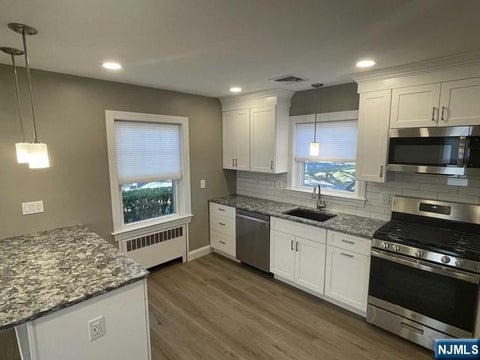Photo of 58 Hastings Ave, Nutley, NJ 07110 (MLS # 26032230)