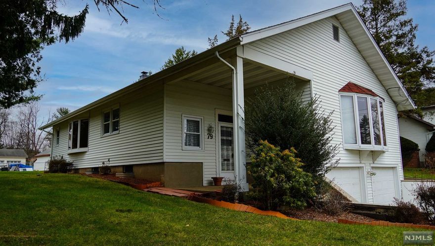 SPACIOUS, WELL-KEPT, CONVENIENTLY-LOCATED RAISED RANCH HOME BOASTS HARDWOOD FLRS THROUGHOUT & PLENTY OF NATURAL LIGHT. READY TO HOST AN OUTDOOR GATHERING ON THE INVITING BRICK PATIO OFF KITCHEN WITH TONS OF STORAGE. PLENTY OF SPACE FOR FRIENDS AND FAMILY WITH LARGE LIVING/FAMILY ROOM WITH EASY ACCESS TO THE GENEROUS DINING ROOM OFF OF KITCHEN. THE WHOLE HOME HAS AN EXCELLENT FLOW WITH THE MAIN FLOOR ROUNDED OUT BY A LARGE MASTER SUITE WITH FULL BATH AND WALK-IN CLOSET, AS WELL AS TWO ADDITIONAL, GENEROUSLY-SIZED BEDROOMS AND ADDITIONAL FULL BATH. THE LOWER-LEVEL IS FRESHLY-PAINTED AND READY TO BE FINISHED. ACCESS TO THREE-CAR GARAGE AND EXTRA WIDE DRIVEWAY MAKES ACCESS INTO AND OUT OF STREET A BREEZE. FANTASTIC TOWN AND COMMUNITY AMENITIES INCLUDE PLENTY OF PARKS, HOUSES OF WORSHIP, AND OPPORTUNITIES FOR RECREATION. CLOSE TO SHOPPING IN MULTIPLE TOWNS, AS WELL AS A TOP-NOTCH SCHOOL DISTRICT AND CONVENIENT TO PUBLIC TRANSIT TO NEW YORK CITY. CONTACT AGENT TO ARRANGE EASY SHOWING