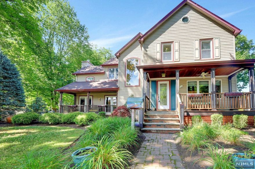 Beautiful colonial home nestled on a serene quiet street in sought after Oradell. The gracious and light-filled floor plan is perfect for entertaining boasting a beautiful fam rm with a cozy gas FP open to the kitchen w lg breakfast nook and sliders leading to outside deck. Formal Livrm and formal dining rm and powder rm off of mud rm, complete the main level. The upper floor feature all 3 br's including a grand master suite w lg WIC and a large elegant windowed bathroom w oversized shower and jacuzzi tub. Large windowed hall bath. Washer Dryer and pull down storage attic, complete the second level. Nice size basement with great storage. Detached two car gar and much more. Set on a oversized flat property in prestigious neighborhood conveniently close to great schools, shopping and easy commute to NYC.