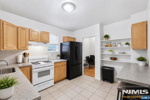 Photo of 17 Highland Terrace, Irvington, NJ 07111 (MLS # 26039618)