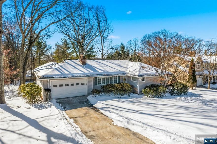 This lovely Ranch style home is NOT a drive-by. You must come inside to see the unexpectedly spacious kitchen and Family room â€“ all facing a Southern exposure back yard that beams with sunlight all day long. You enter a carpeted Living room with wood burning fireplace which opens to a Dining area, Kitchen and Family room all facing the sunny backyard and deck. How beautiful it will be to peak out your kitchen window at the Spring garden. That same spacious kitchen has lots of granite counter space, stainless steel appliances, tile floor and wood cabinetry with room to add an island if you wish. The rest of the First Floor offers the main bedroom with ensuite bath, two bedrooms sharing a renovated full bath, a most convenient laundry area and entry to a garage which can accommodate 1 1/2 , maybe two cars! The walkout basement offers a large area in which to create your dream space. Other pluses: 200 AMP electric box; one Furnace replaced this month for two zone heat; Generac generator, just in case and roof replaced in 2023.
