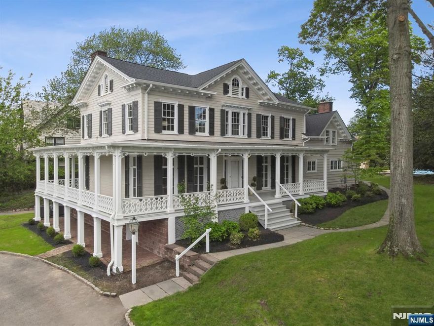 Nestled in a prime location directly across the street from beautiful Edgemont park and only .4 miles to the NYC train, this spacious 5 bed, 4 and a half bath home blends timeless charm with modern convenience. A welcoming, expansive front porch sets the tone for this gracious residence, leading to sun-filled living spaces perfect for both relaxing and entertaining. The first floor offers a flowing layout with a large living room, formal dining area, and a library or office complete with a family room next to the kitchen. Upstairs, enjoy the ease of a dedicated laundry room, along with a brand new primary bath and a new jack and jill bath connecting two of the bedrooms. Additionally, there is an ensuite bathroom for the fourth bedroom and a final full bath next to the 5th bedroom. The primary bedroom features 2 brand new walk-in closets. The primary bath has a stall shower, soaking tub, double sink and additional vanity. Other 2025 updates include a brand new roof, newly refinished floors, freshly painted interior AND exterior, new flooring in the kitchen and family room and a new wood fence along the back. This move-in ready home offers the rare combination of an elegant home with fresh updates and fabulous location, adjacent to beautiful green spaces with quick access to NYC. Featuring high ceilings and floor to ceiling windows throughout the first floor it evokes the southern charm of Charleston.