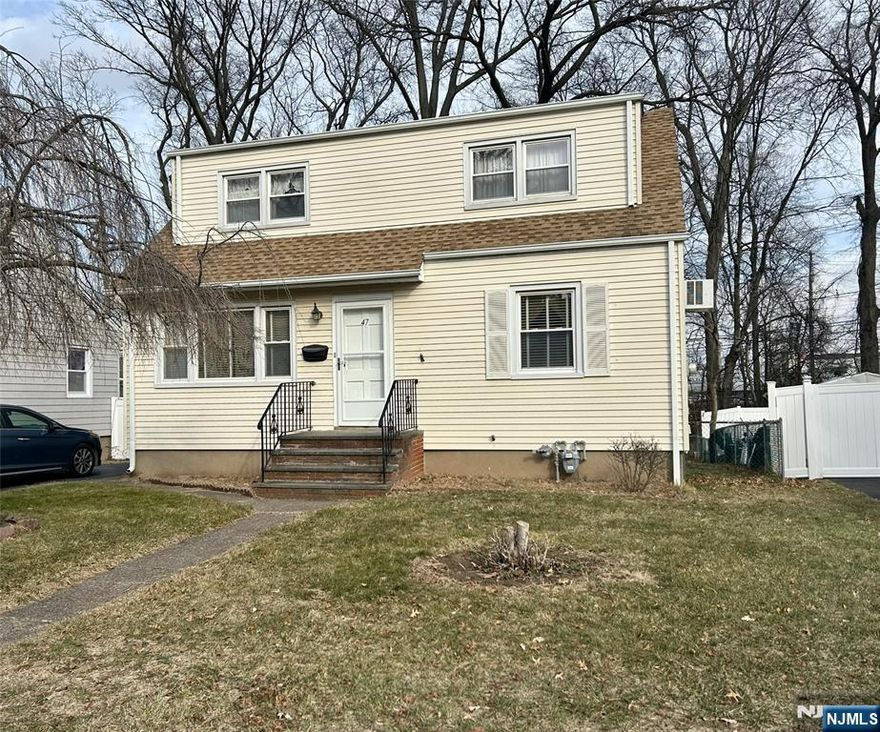 Expanded Cape Cod in a wonderful neighborhood, ready to make your own! An ideal layout on the main level with hardwood floors (original primary bedroom was converted into a formal dining room). A nicely sized living room with a picture window setup offering plenty of sunshine. Many possibilities of use in the full, unfinished basement w/storage room. A fenced-in backyard and a new roof that complements the cream colored siding. Very close to shopping, restaurants & transportation (1.3 miles to train station). Reasonable property tax. Blue Ribbon School District, concerts in the park, weekly farmers market, and steps to the Sports & Rec Complex. Enjoy everything this charming town has to offer!