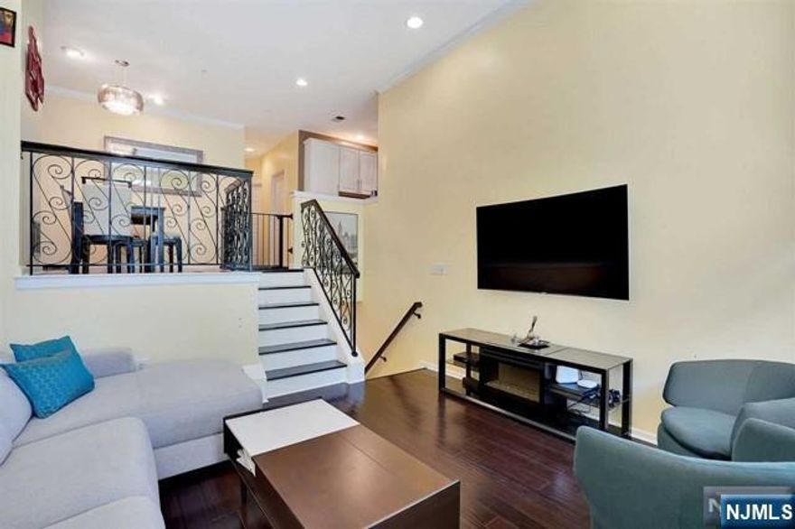 Welcome home to this elegant 2 bed plus den 2 full bath, Albany model, townhouse located in Jacobs Ferry. This 1,228 sqft home features gleaming hardwood flooring throughout, new raw iron railings, and faces both North and South for great sun exposure throughout the day. The chef's kitchen come equip with SS appliances including gas stove, microwave, refrigerator, and dishwasher. Enjoy the primary-ensuite featuring an updated primary bath and walk-in closet with a generous sized second bedroom right across the hall. The large den can be used as a play area, home office, or an extra bedroom. The home comes with an in-unit W/D and parking for 2 cars! You can get all the home offers within a community that offers 24hr security, 2 pools, children playground, shuttle to/from ferry and NYC bus at entrance! Don't miss out!