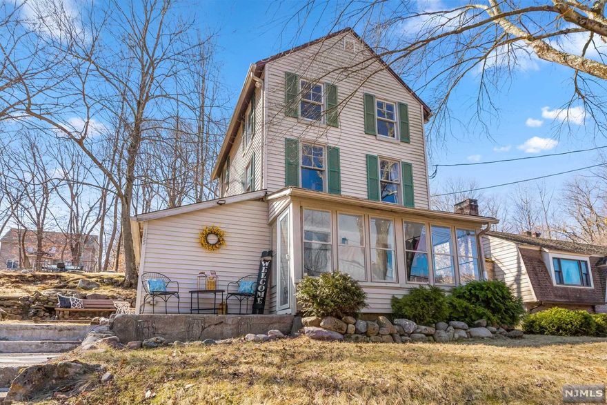 Why rent when you can own! Bright, sunny enclosed porch welcomes you to this warm and inviting open concept home. Kitchen opens to eating area and Living room. It has 3 bedrooms, 2 updated baths on a large wooded lot. Imagine having breakfast on your wonderful deck overlooking a tranquil stream. Welcome home!