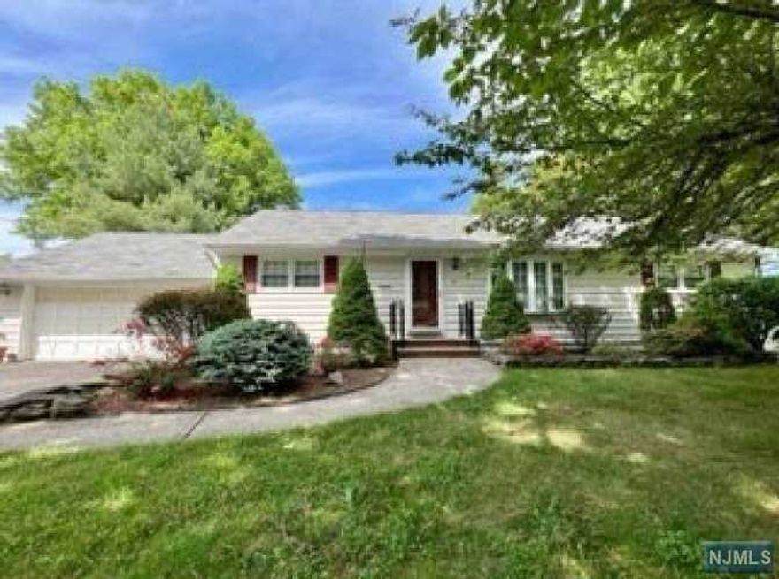 Move right in to this freshly painted, well-maintained ranch home with three bedrooms, 2 full baths, skylight in kitchen, finished basement, 2 car garage, central air conditioning & a well-sized lot. Prime location, beautiful tree-lined street, just a minute to Route 17 & GSP. Convenient to shopping, dining & all highways. Light the fireplace in this winter, or enjoy coffee on the deck come spring. Enjoy outstanding Paramus Schools, low taxes, beautiful tree-lined streets.