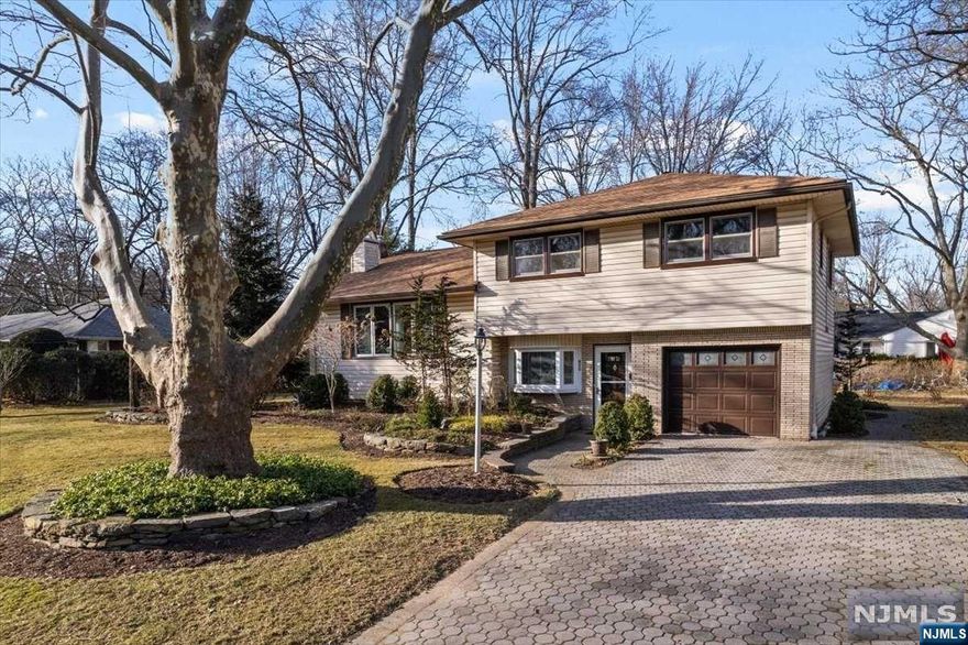 Welcome to Sloat Place, just off Rivervale Road and north of Pascack Brook County Park, offering a lovely setting with beautiful landscaping. This very well cared for home starts with the paver driveway. As you enter this sugar maple split from the garage or the front door, you can proceed up to the living room or down to the family room. The comfortable living room has a fireplace, with hardwood floors under the carpeting. The kitchen has lovely maple cabinets and all white appliances. Head upstairs to the 3 bedrooms and 2 full bathrooms. Adjacent to the family room is plenty of storage in the mechanical room. Relax outside in the beautifully landscaped backyard. Rivervale has so much to offer including top rated schools, an easy commute into NYC by car, rail and bus. Come see this house today.