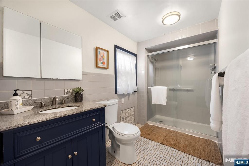 Photo of 8 Highmont Terrace, Montclair, NJ 07042 (MLS # 25043407)