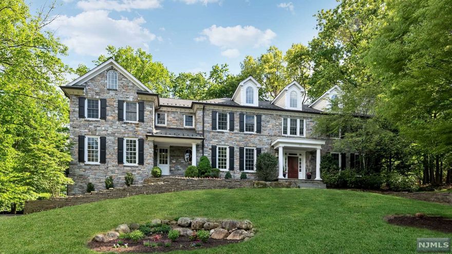 Classic Architecture meets Modern Day Style and Design in this extraordinary home located in one of Franklin Lakes most desirable neighborhoods. Only steps away from the town's famous Indian Trail Club and Market Basket Shopping Center, residence here enjoy the best of the best in terms of town amenities and lifestyle. Find over 7300 sf of chic luxury. Relax and socialize in any of the main rms including a tranquil LR, expansive kit/open fam rm, and banquet sized DR. Work from home in the custom library w/fpl and fr doors to an awesome covered porch overlooking the back yard. All 5 Br's on the 2nd fl are peaceful and inviting. Primary br w/fpl, 2 WIC, plus LUXE Bth w/radiant. 2 add'l ensuites and 2 more br's share a jack and jill bth, 2nd fl lndry. LL w/ample play space, theatre, arts and crafts, kitchenette, full bth. PERFECT mudrm w/bath! Hardwood floors throughout, whole house generator, radiant heat in kit, mud rm, prim bth. Cul-de-sac location w/rm for a pool!