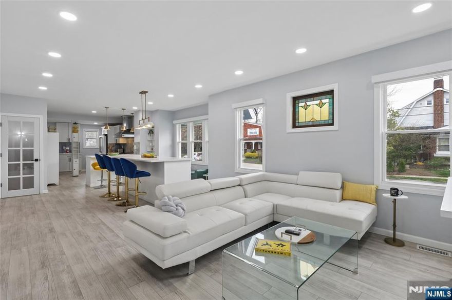 The best location in Fair Lawn: 2 blocks from Memorial Middle School, pool, park & dog park. Houses of worship, buses to NYC & in NJ are right out. Stunning sun lit modern fully renovated almost 3,000sqft house. Low property tax. Brand new: roof, floors, privacy fence, gorgeous paved 5 car driveway, multi-level central AC & heating, 200amp electric panel. 1st floor open concept/loft with entertainment area & gorgeous gourmet kitchen with high-end Forno & Cafe appliances, quartz countertops, double sink, huge island with built-in wine cooler & microwave. Professional 48â€ stove-10 burners, 2 ovens, & 48" exhaust fan. Blackout remote controlled blinds. Large windows. High ceilings. Recessed lighting with dimmers. Marble electric fireplace. 5 king size bedrooms with walk-in closets. 2 primary bedroom suites (1 on each floor). 5 stunning bathrooms w smart toilets, bidets, LED med cabinets & vanities with marble counters. Large entry foyer/Florida room has mudroom, sitting area & coffee nook for large gatherings. A large 2 bedroom 2 bathroom suite located on the 1st floor. 3 bedrooms & 2 bathrooms located on the 2nd floor. 5th 4pc windowed bathroom with shower & jacuzzi, huge living space & 2 windowed bonus rooms/offices located in the finished basement with separate entrance. Laundry room with high-end washer & dryer. Picturesque yard with emerald grass. House is located on a hill, so flood insurance not required. Basement was never flooded. New built-in sump pump. Owner has NJR