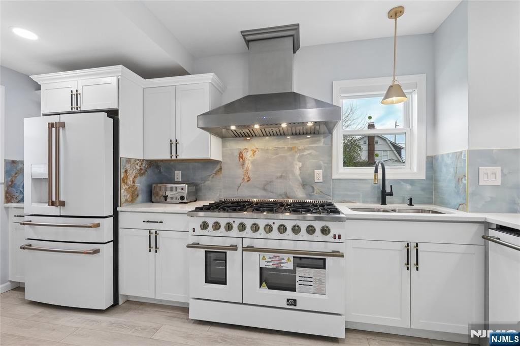 Photo of 89 Morlot Avenue, Fair Lawn, NJ 07410 (MLS # 26011308)