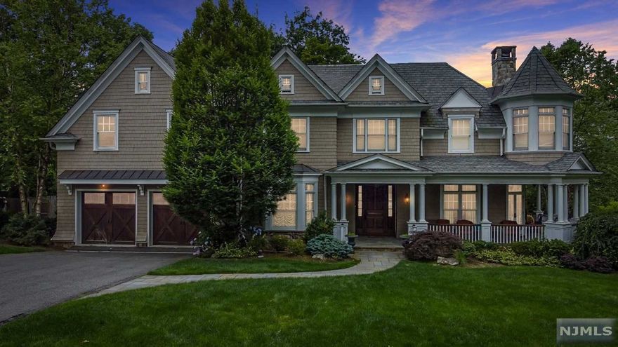 Stunning dream home for sale in the heart of Teaneck! This fully custom and elegant home was completed in 2010 Designed by James Paragano with no detail overlooked. You are greeted with a beautiful wraparound front porch. Entering the home, you are amazed by the beautiful entry foyer, formal living room, family room, and banquet sized dining room great for hosting. In addition, the floor boasts a large modern kitchen with eat in dinette area, home office, 1.5 bathrooms, as well as a mud room area and 2 car garage. Second floor features a gorgeous master bedroom with a reading room, 2 walk-in closets, full spa style bathroom with amazing sunset views. 4 additional bedrooms suites and an additional lounge room to complete the second floor. Finished third level with a large rec room, bedroom, bathroom, and storage closets. Spacious basement with a large rec room, home gym, half court basketball court with 22 ft ceilings, bedroom and bathroom, making entertaining easy.