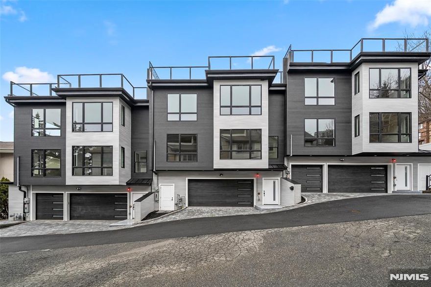 This stunning triplex offers breathtaking views of the mountains, river, and NYC skyline. Located on a quiet dead-end st., it provides a peaceful environment. The property features a 3-car garage and 3 parking spaces.3600 sf, this spectacular multi-level townhome is built on a solid poured concrete foundation and 12-inch-thick concrete walls, ensuring durability. FR w/ porcelain tile & bath - Private backyard with patio. Elegant staircase to the 2nd FL. Open LR with breathtaking views of the Hudson River and NYC skyline through a large picture window- Open kitchen featuring an oversized quartz island and S.S appliances, Full DR& The third floor includes a large primary bedroom w/ a full bath, a separate shower room, a soaking tub, and a walk-in closet. Thereâ€™s also a large two-bedroom suite that comes with its own bathroom.- The fourth floor can be used as a master suite with an open layout, summer kitchen/wet bar, and sliding glass doors that lead to a rooftop deck. The deck is outfitted with glass railings, making it perfect for entertaining and enjoying the fantastic views. Additional features of this custom-built home include oversized Anderson windows, recessed lighting, a separate garbage room, all-paved parking lots, a baseboard heating system with 6 zones & 2-zone CA, CV System. Conveniently located just minutes from the Edgewater/NYC Ferry and the George Washington Bridge, this property is also close to shopping, transportation, and restaurants.