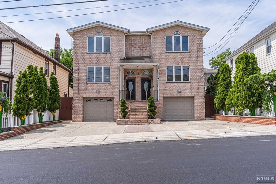 Completely empty 2 family brick side by side duplex ready to move in. Each side has 3 levels of living space with kitchen that open up to private balcony that overlook backyard. Master bedrooms features master bath, high ceilings and double closets. Hardwood floors throughout with plenty of closet space. Finished ground level with summer kitchen and access to backyard. Enjoy those summer nights in great outdoor space.