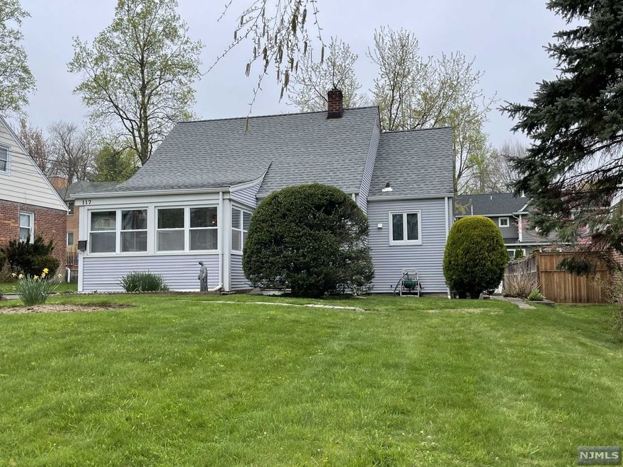 Location location location ! Great investment property or opportunity to renovate, expand or build. This cape cod boasts fabulous bones, hardwood floors throughout, front porch entryway, 50x120 lot. Located just 2 blocks from all 3 schools; the high school, elementary school, and middle school. Express bus to downtown NYC located at end of block, 14 minutes to George Washington Bridge. Great opportunity to own a house in Tenafly. House being sold 'as is condition' limited to structural and environmental issues.