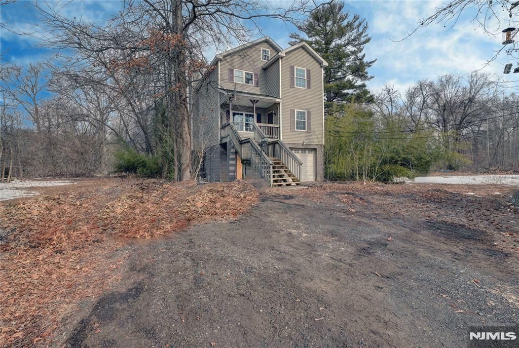 Photo of 74 Camp Lane, Fairfield, NJ 07004 (MLS # 26006903)