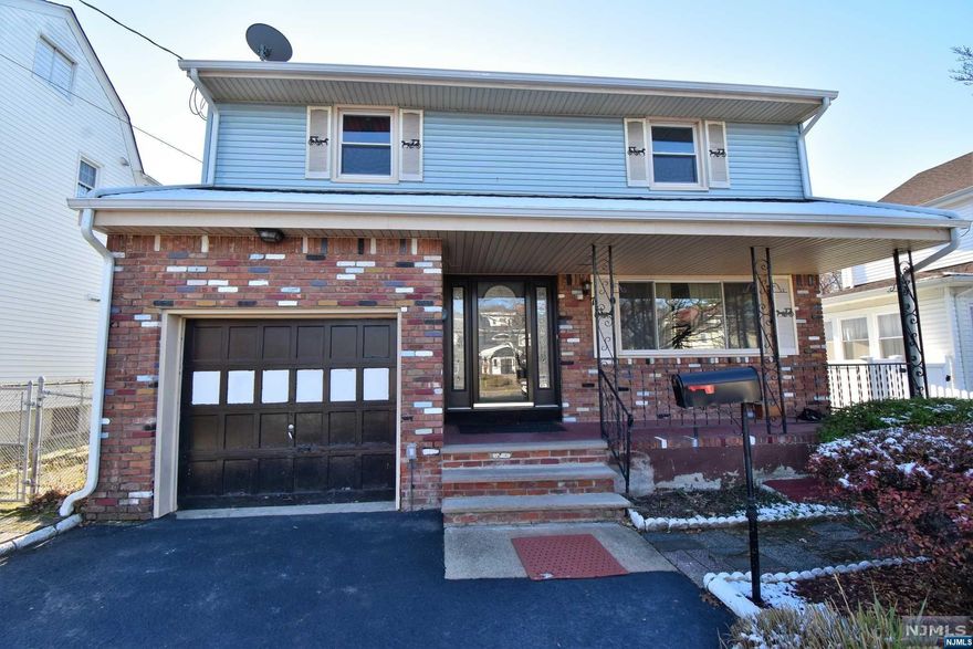 Picturesque property with so much to offer. Beautiful Colonial w/porch to enjoy all year round. As you enter the home you are greeted with a large living room that opens into the renovated kitchen fitted w/stainless steel appliances & a 5 burner F. lli.Bertazzoni stove, center island & dining area. Coat closet & powder room complete the 1st floor. As you go to the 2nd floor, you are greeted w/large Master Suite w/master bath - shower stall, 2 double closets w/attic access from one of the closets. 2nd Bdrm has 2 double closets & 3rd bdrm has a double closet. Spacious full bath. Hardwood floors throughout the home. Back yard greets you w/covered patio, perfect for entertaining. Deep yard adorned w/gardens. Brand new shed "out building" complete w/electric - perfect as a workshop, artist studio. Exterior brick & siding. One car garage w/driveway fits 3 cars. 220 electric. This is the one! Being sold as-is, home inspection for informational purposes.