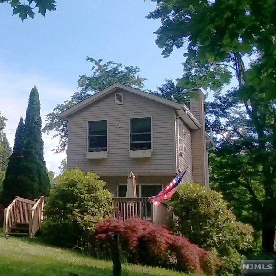 Absolutely adorable 1 BR house in neighborhood of much more expensive homes. Level yard with storage shed. Large entertainment sized deck on front of house just stripped and painted. Large Living Room with lots of light and laminate floor leads to step down tiled Kitchen with door to rear of property. Upstairs bedroom has two closets and full remodeled bath. Both interior and exterior access to basement with washer/dryer and all utilities. Location is ideal--easy access to both Rt 23 and Rt 15. Minutes from Milton shopping plaza and stores. Seller discloses property is currently serviced by a cesspool. Seller will replace with conventional septic system prior to closing,but would prefer buyer with FHA 203K loan that can close and complete septic post-closing. Design work is already in process. You will not be disappointed. This is just cute as a button for the right buyer.