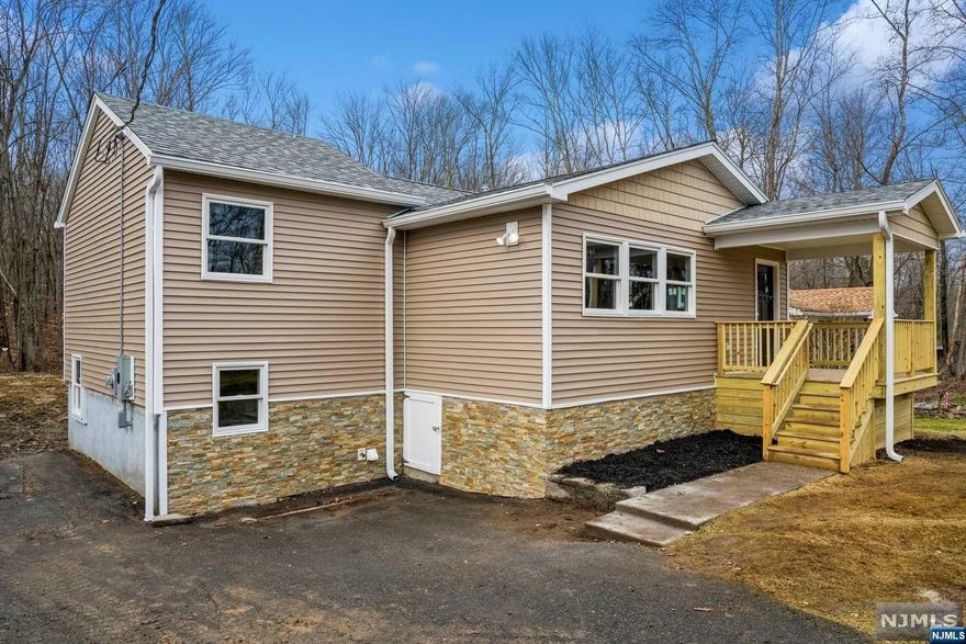 Welcome to 233 Fairview Ave, a delightful residence nestled in the heart of Hampton, walking distance from Lake Kemah. This charming 2 bedroom, 2 bathroom home offers a perfect blend of comfort and style. Walk into this beautifully and skillfully renovated home offering granite counter tops, plenty of cabinets and a center island. Our two newly renovated bathrooms offer beautiful updates and showers, along with modern vanities and tile and pocket doors to boot! 2 bedrooms including closets for storage or wardrobe-your choice. In the lower level, we have a fully finished walkout basement with stackable W/D. Backyard offers room to play and entertain, 16x8 deck to be built (once brand new 2 bedroom septic is installed). Fully renovated, fully updated, new electrical, plumbing, HVAC and so many more updates, this is a MUST SEE. Looking for that quiet street on a lake community? Look no further, we are walking distance from Lake Kemah! WILL NOT LAST!