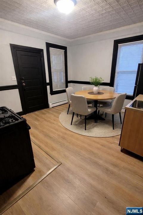 Photo of 300 Morrissee Ave #2 R, Haledon, NJ 07508 (MLS # 26005911)