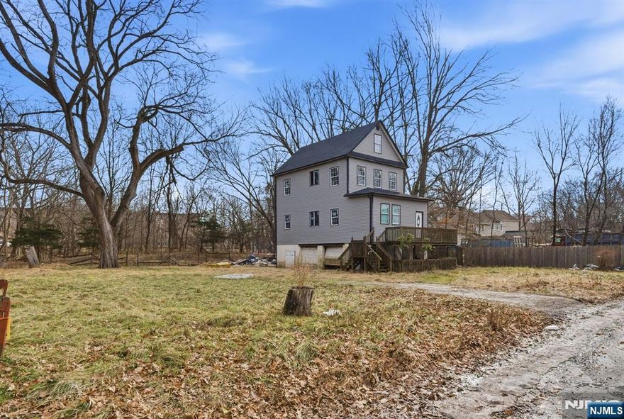 This property sits on an impressive 108 x 110 lot on a dead end, an exceptionally rare opportunity with endless potential. The home has been fully gutted down to the studs, providing a true blank canvas for your vision. Architectural drawings without approvals and a current survey are available to showcase the intended layout and future possibilities. The renovation was framed for a spacious three story open concept design featuring 5 bedrooms, 3 bathrooms, a 2 car garage, and a massive attic, with soaring volume ceilings on both levels. Surrounded by beautiful surroundings and offering tremendous flexibility, this property is ideal for a builder, contractor, or anyone seeking significant space, including car enthusiasts who value parking capacity and lot size. An exceptional opportunity to create something truly special. PLEASE NOTE: THE AMOUNT OF BEDROOMS AND BATHROOMS IS BASED ON WHAT IT IS INTENDED TO DO, NOT APPROVED.