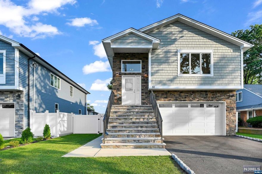 H&B due Tuesday August 8 by 5pm This stunning, sunlit 2612 sq ft. custom colonial built in 2021 features 4 spacious bedrooms, 3 full bathrooms, a stunning open concept kitchen with gray custom cabinetry, s center island, pantry & gorgeous countertops. The living room/dining room is bright and spacious with high ceilings. The primary bedroom on the main floor is ensuite with an additional 3 bedrooms on this floor. Head down to another bedroom with another full bathroom, family room, sliding doors to a private deck and a fenced in yard with a seperate entrance which is perfect for an in-law suite. Downstairs, the basement is finished and can be used as a gym, family room, playroom, office - endless possibilities. There is tons of storage and a 2 car attached garage along with a driveway that would fit 3-4 cars. Oak wood flooring throughout the entire home. Just move your things in...this home is turn key ready!