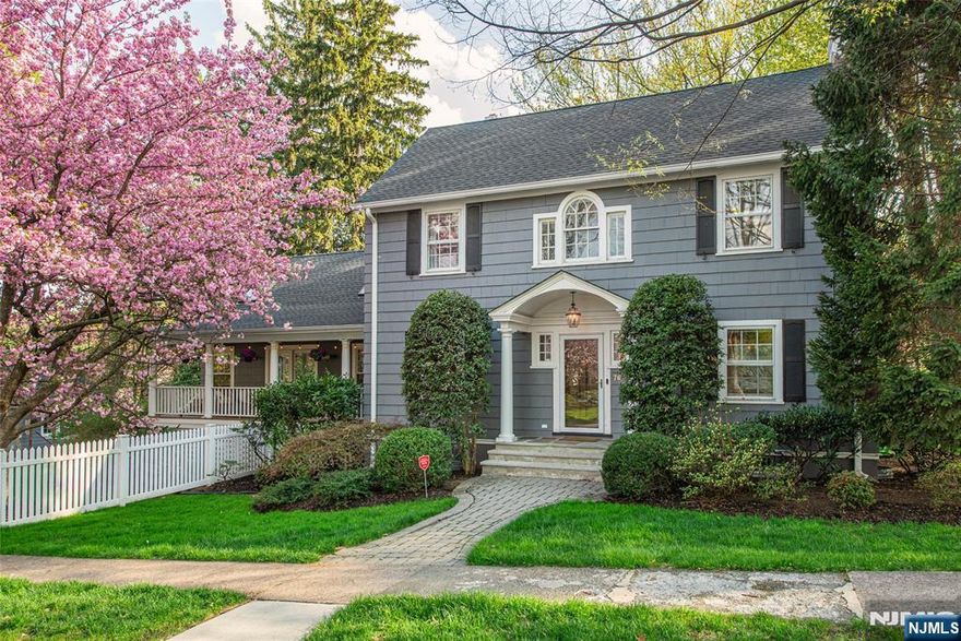 Finally, a house that understands the assignment! This 5-bed, 3.1 bath Colonial has the space, flow, and common sense layout you've been waiting for - because nobody wants "charming to mean tiny closets and one outlet per room. Formal living and dining rooms bring the classic vibe, while the first-floor office/sunroom gives you options: work-from-home, homework zone, or a place to hide for 20 minutes and pretend you're on an important call. The kitchen opens onto a huge family room with soaring 20-foot ceilings, skylights bring tons of natural light, and enough room for movie nights, holidays, or everyone being together while doing completely different things. You know, real life. Upstairs, the primary suite is the reward for making it through the day, with a walk-in closet and a spacious bath featuring soaking tub, stall shower, and vanity for two. Two more generously sized bedrooms share a Jack-and-Jill bath. Up on the third, two more beds and a full bath.Basement rec room is perfect as teen hangout, media room, or the grown-up version of a place where no one touches your stuff. And bonus: already plumbed for a future bathroom. The location is a total wow - just a 12-minute stroll to Upper Montclair for restaurants, coffee shops, and schmying. Close to Yantacaw Brook, Brookdale, and Tuers Parks. Easy NYC transportation when duty calls, suburban peace, when it doesn't.