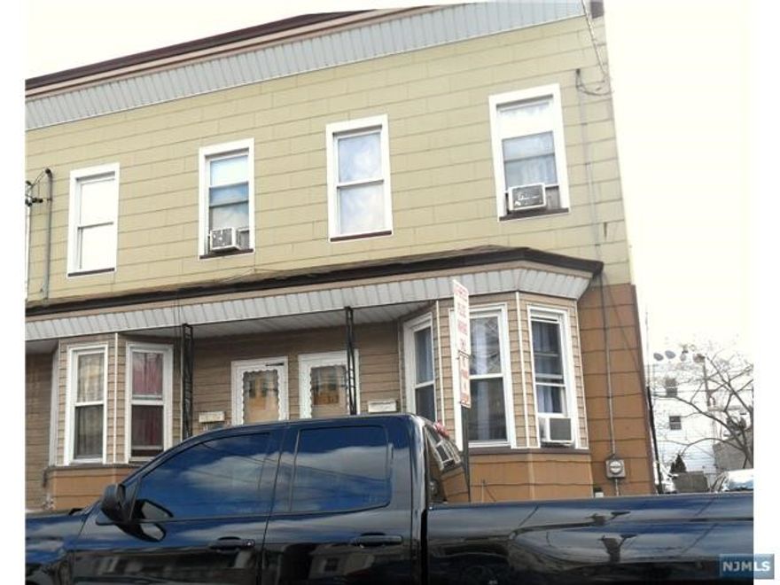 4 single family attached homes all on 2 floors with basements. Parking in the back of the property.