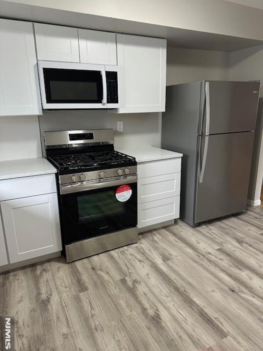 Welcome to this 2 Family Home in Rutherford! This Newly Updated 3 Bedroom Unit is located on Second Floor of a Quiet Street. Hardwood floors throughout with new kitchen and new appliances. There are 3 good sized bedrooms and a brand new full bathroom. Washer and Dryer in Basement and Parking for 1 car in the driveway. No pets please.