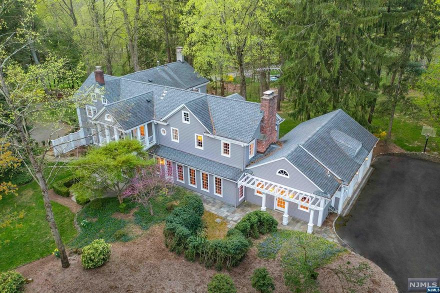 INCREDIBLE OPPORTUNITY TO OWN THIS PIECE OF HISTORY UPDATED FOR MODERN LIVING. SITUATED ON A KNOLL IN PRIME LOCATION, THIS LOVLEY 4 BEDROOM COLONIAL IS RICH IN HISTORY. CUSTOM MILL WORK, WIDE PLAN FLRS W/HAND MADE NAILS, LEADED GLASS WNDWS,3FP'S & INCRED NATURAL LIGHT. LARGE ENTRY FOYER W/WIDE PLAN FLOORS, THE DR IS THE ORIG PORTION OF THE HOME LATE 1800'S W/FP & ORIG MILL WORK. THE BRIGHT LR W/FP IS BACK TO FRONT W/WALLS OF WINDOWS. BRIGHT SPACIOUS KITCHEN W/BREAKFAST ROOM & VIEWS OF 2 ACRE LUSH PROPERTY. ONE OF A KIND FM RM W/FP& CUSTOM BEAMS FROM ANTIQUE BARN & WALLS OF WINDOWS. LOVELY PR, MUD RM & LNDRY ROOM LEAD TO 3 CAR GARAGE. THE 2ND FL OFFERS LARGE PRIMARY SUITE W/FP, LUX BATH & PRIV BALCONY OVERLOOKING THE PROPERTY. 3 ADDT'L BR'S, ONE W/SITTG RM & CEDAR CLOSET, LARGE FULL BATH & AMPLE CLOSETS COMPL THE 2ND FL. LOWER LVL OFFERS FULL BATH GYM/REC AREA. NEWR SEPTIC, GENERATOR, LOW TAXES, 2 DRIVEWAYS(ONE ON KENWOOD). OWN YOUR OWN PIECE OF SADDLE RIVER HISTORY ON 2 ACRES