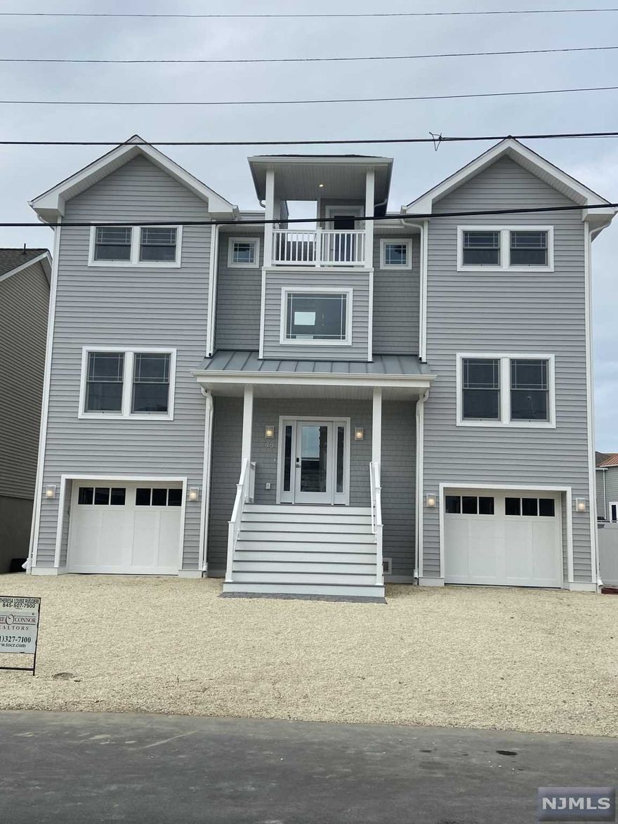 *Don't Miss Out On This Summer Immediate Occupancy* A Must See Property New Construction Designed by Studio Tagland and built by a Premier LBI Builder. 5 Bedroom (1 Master Bedroom, 1 Junior Master, Possible 6th Bedroom), 3.5 Bath, Gas Fireplace, GE Monogram Kitchen with a 48" Oven and 48" Refrigerator, 3 Stop Elevator, 60 ft. of Bulkhead, Newly renovated piling dock, Heated Saltwater Pool, Bullnose, Paver Patio and Fencing on an Oversized lot 80 x 60 *See attached design by Studio Tagland* Just minutes to Best Restaurants, Shopping, Great School System, Nightlife and Best Beaches in NJ A lifetime of memories are waiting for the right buyer