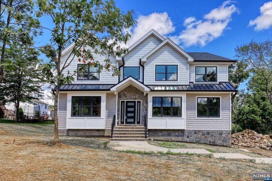 Spectacular NEW CONSTRUCTION w/top amenities TO BE COMPLETED FALL 2023. Builder is offering customization from the ground up! A wonderful opportunity to build your dream home customized to your wants and needs. Boasting 6BDR, 4BTH, 3-car garage & offering all the bells & whistles. This home is destined to impress. Featuring exquisite hardwood floors, ultra-high ceilings, tray ceilings, grand entry foyer w/stunning living room, dining room, family room w/open concept feel plus fire place, & kitchen built for a chef, top-tier appliances leading to the patio. Convenient 1st floor bedroom/guest room office and full bath. 2nd floor offers master suite which also includes WIC four more bedrooms, laundry room and 3 baths.