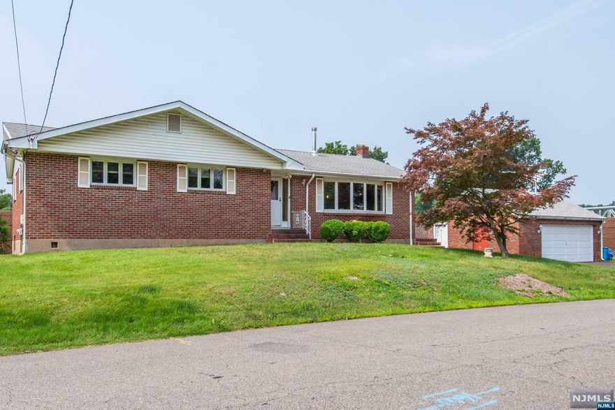 Welcome to this charming ranch-style home located in the coveted Richfield Section of Clifton! With 2 beds and 3.5 baths. As you enter, you'll be greeted by a lovely entrance leading to a spacious living room and dining area. The primary bedroom is a retreat in itself, featuring an ensuite bathroom and generous closet space. The second bedroom is equally comfortable and can serve as a guest room, home office, or a space for your hobbies. A second full bathroom ensures convenience and privacy for everyone. The kitchen is a chef's dream. Adjacent to the kitchen, you'll find a laundry room for added convenience, along with an additional half bath for guests. The basement is vast and ready for your personal touch, offering limitless potential for a recreation room, home office, or storage area. Completing this property is a detached two-car garage, providing secure parking and extra storage space. Located close to NYC transportation, commuting will be a breeze.