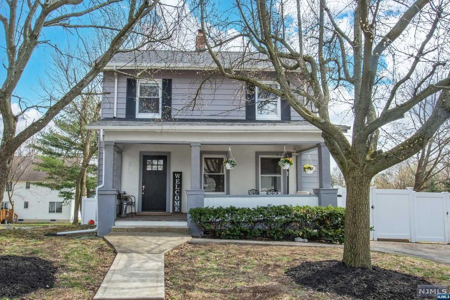 Experience the perfect blend of old-world charm and modern updates in this beautifully maintained colonial home. Nestled on a peaceful street, this residence boasts three generously sized bedrooms and gleaming hardwood floors throughout. Step into a bright and airy home with an inviting white, eat-in kitchen featuring stylish stainless steel appliances, eye-catching backsplash, and chic quartz counter tops. The formal living room and open porch are perfect for relaxing, while the walk-up attic provides plenty of extra storage space. Entertain family and friends with ease in the lower level family room or rec room, with easy access to a lovely backyard, complete with a deck and storage shed. This gorgeous home is sure to delight even the most discerning buyer. Great school system. Close to NYC transportation, shopping and great restaurants.