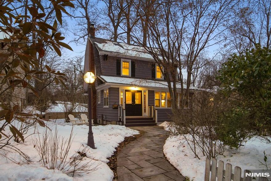 Chic, stylish, and full of character, this Upper Montclair colonial is a true delight. Step through the charming enclosed front porch and into a home where old-world craftsmanship meets modern comfort. Sunlight pours across rich hardwood floors, highlighting classic details like leaded-glass windows and a welcoming wood-burning fireplace. The beautifully renovated kitchen features high-end stainless steel appliances, leathered granite countertops, and thoughtful touches that make cooking a joy. Upstairs, the newly refreshed full bath offers a serene escape with its soaking tub and luxurious stall shower. With 4 bedrooms, 1.5 baths, a newer roof, newer windows, and easy access to NYC bus and train linesâ€”not to mention all the shops, cafés, and parks that Upper Montclair is known forâ€”this home blends convenience with timeless charm. Become a part of one of the friendliest neighborhoods in town with its 45 plus years tradition of block parties & Halloween parades. Welcome Home!