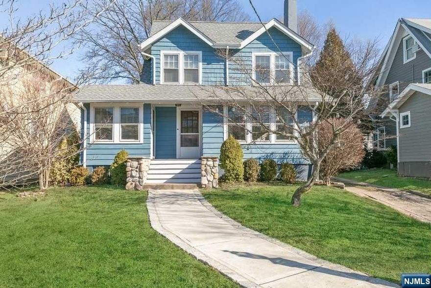 Welcome to Washington Place! This wonderfully updated home is located in the heart of Ridgewood and exudes pride of ownership. Just minutes to town and schools, no need to take the car out of the driveway. The traditional architecture seamlessly blends a flexible floor-plan with just the right amount of privacy. Get cozy in front of the fireplace or work from home in the Sun Room. The first floor living space beautifully showcases the woodwork you find throughout the house. Lovely hardwood flooring is enhanced by the neutral color palate. The cheerful kitchen is ideally set for you to bring in the groceries from the rear deck and driveway. Upstairs you will find three second floor bedrooms and a newly finished fourth bedroom on the third floor. The basement level has the laundry area, built in cabinetry, plenty of storage as well as a workroom. Year round you can enjoy the festively lit rear deck and back property. Fire up the grill, set up an outdoor movie and enjoy!