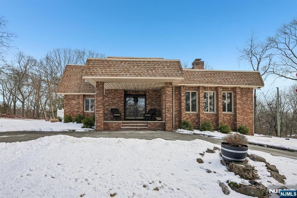 Photo of 845 Rifle Camp Road, Woodland Park, NJ 07424 (MLS # 26003037)