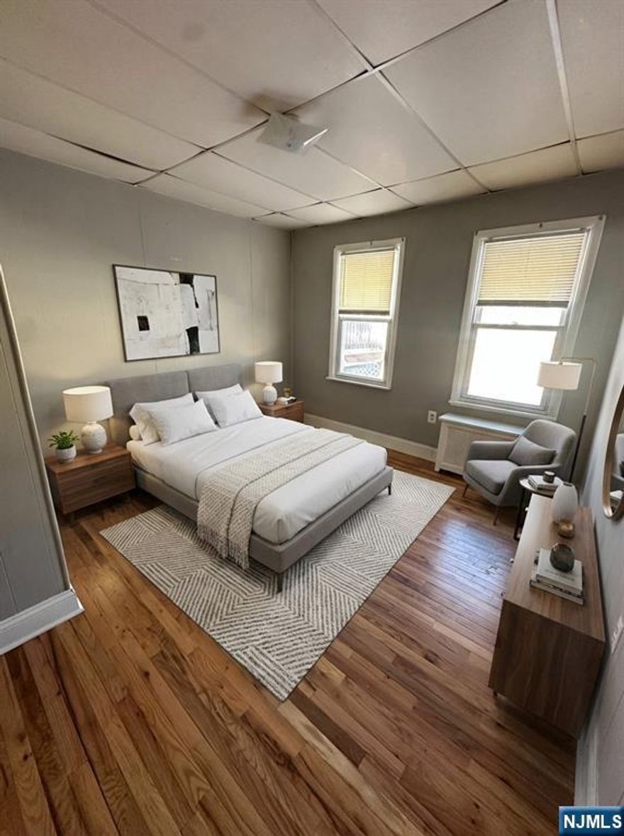 Commuter perfection! This cozy 2-bedroom apartment offers unbeatable proximity to Highland Ave and South Orange train stations. Enjoy "lock-and-leave" convenience with the city's top attractions right at your fingertips. Transit: Footsteps to NYC-direct trains. Vibe: Quiet, relaxed, and move-in ready. Location: The best of urban living with a neighborhood feel.