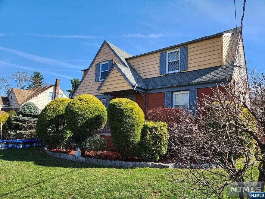 Well maintained two family home. 1st floor living room, formal dining room, modern kitchen, master bedroom, bedroom and possible third bedroom or office. 2nd floor living room, modern eat in kitchen dining room two bedrooms and full bath (last tenant used living room as a bedroom and used dining room as the living room). Two car Garage and driveway parking for at least 6 cars. In rear yard there is a cinderblock storage garage with electric. Separate newer gas furnaces, newer hot water heaters, new chimney liner. Separate gas and electric. Lot size 80 x 100. Convenient location with easy access to NYC transportation. Walk to shopping and schools. Investment opportunity!! A must see to appreciate!!!