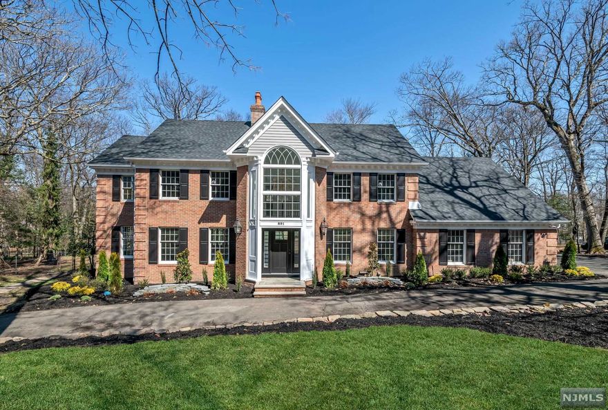 South Gate - one of Franklin Lakes' most coveted locations - is home to this 4600 sf Custom Brick Colonial that sits on 1.1 acres featuring a gorgeous pool, a huge party deck and lots of privacy! Total renovations have taken this 5 bedroom 5 1/2 bth home to another level. Brand new kitchen w/walls of sliding doors and skylights, new bathrooms, newly refinished floors, freshly painted throughout, new lighting, new roof, newly resurfaced pool w/new heater, filter and more! Gorgeous 2-story entry foyer opens to a banquet sized DR, cozy LR w/fpl and French drs, private home office, plus a huge Fam Rm w/fpl, built-ins, walls of glass leading to the back yard oasis! The kit is of the latest design and just off the 3 car gar and mud room/laundry area. 1st fl ensuite br great for guests and in-laws. The 2nd fl has a sumptuous Primary Suite with tray ceiling, fpl, WIC and spacious bth. 3 more brs have private bths and notable closet space. House-Perfect in a location that everyone wants!