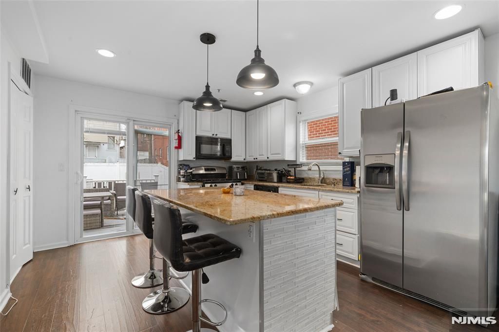 Photo of 8512 Smith Avenue, North Bergen, NJ 07047 (MLS # 26005755)