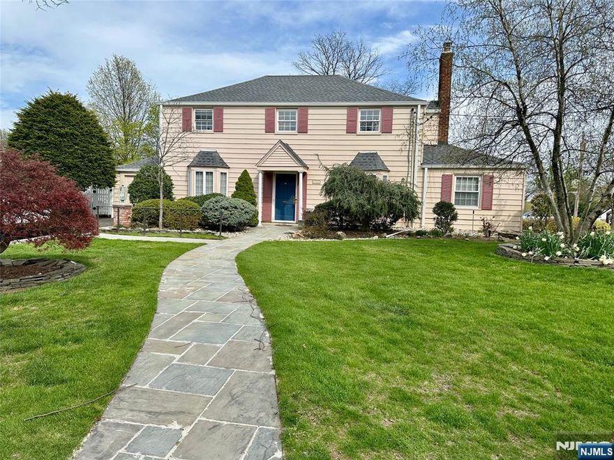 Supremely convenient River Edge location! This move-in ready 4 BR, 2 full bath Colonial is ideally situated approx. 1 block from the elementary school and 1 block to Kinderkamack Rd and NYC transportation. Updated kitchen and baths, hardwood floors, central air and additional upgrades make this a home buyers will love. Improvements include updated 200 amp electric, newer boiler and hot water heater. Inviting curb appeal with a winding stone walkway. Full basement offers great potential to finish for additional living space. Attached garage and multi-car driveway. Private fenced yard with patio. Wonderful opportunity in sought-after River Edge.