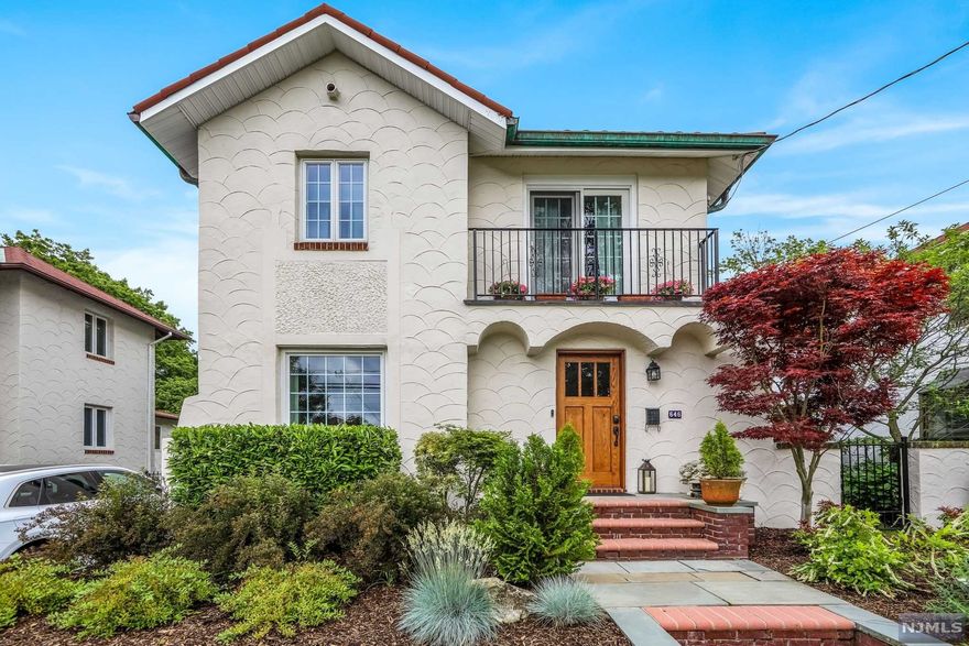 Totally, Beautifully, and Recently Renovated, 4 Bedroom, 3.5 fbth, Mediterranean Inspired Colonial. Located in a Fantastic Neighborhood in the Sought-After Town of River Edge, This Home is close to NYC Trans., Schools, Shopping and EZ access to Major Highways. Stunning Bathrooms, Extensive, Custom Built-ins and Millwork, W/B Fireplace, Gourmet Grade Appliances in Custom Cabinetry Kitchen including "Viking" Stove, Richly Stained and Finished Hardwood Throughout Home (as in), French Doors in Family Room Overlook Deep and Private Backyard, Central Air, Mason Stucco Exterior, Clay Shingled Roofing, Newly Paved Driveway, Det.Gar w/ Accompanying "Potter's/She Shed, Prim.BR Ste, complete with "Walk-in" Closet, Lux. New Bathroom, Vaulted Ceilings with Ceiling Fan Overlooking the Beautiful Gardens, Finished Basement with Full bath and Laundry adds Additional Living Space, No Room Untouched, the Quintessential "Turnkey" Ready Home, all Expressed in Subtle Neutral Tones. A Must See!!