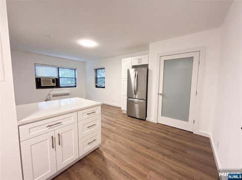 Photo of 3081 Edwin Avenue #1H, Fort Lee, NJ 07024 (MLS # 26025664)