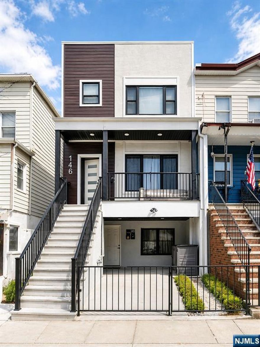 A Rare Opportunity in the Heart of Jersey City Heights Welcome to this light-filled and exceptional 2-family home located in the heart of Jersey City Heights offering the perfect blend of convenience, space, and investment potential. Just minutes from Washington Park, NJ Transit bus access to Hoboken and NYC, the light rail, and Hoboken, this home provides unbeatable commuter access. This multi-family residence features open layouts and skyline views from the private rooftop. Essentially a full rebuild from the ground up, the property was completely reconstructed with new systems, including plumbing and sewer, while retaining only the front structural frame offering the feel of a modern new construction. Unit 1 offers 4 bedrooms, 3 full baths, a den, in-unit washer/dryer, a new ceiling cassette heating/cooling system, private entrance, and backyard access. Unit 2 includes 2 bedrooms, 2 full baths, in-unit washer/dryer, and a private rooftop with panoramic NYC views. Perfect for owner-occupants or investors, this property offers strong rental potential, flexibility, and long-term value in one of Jersey City Heightsâ€™ most desirable locations.